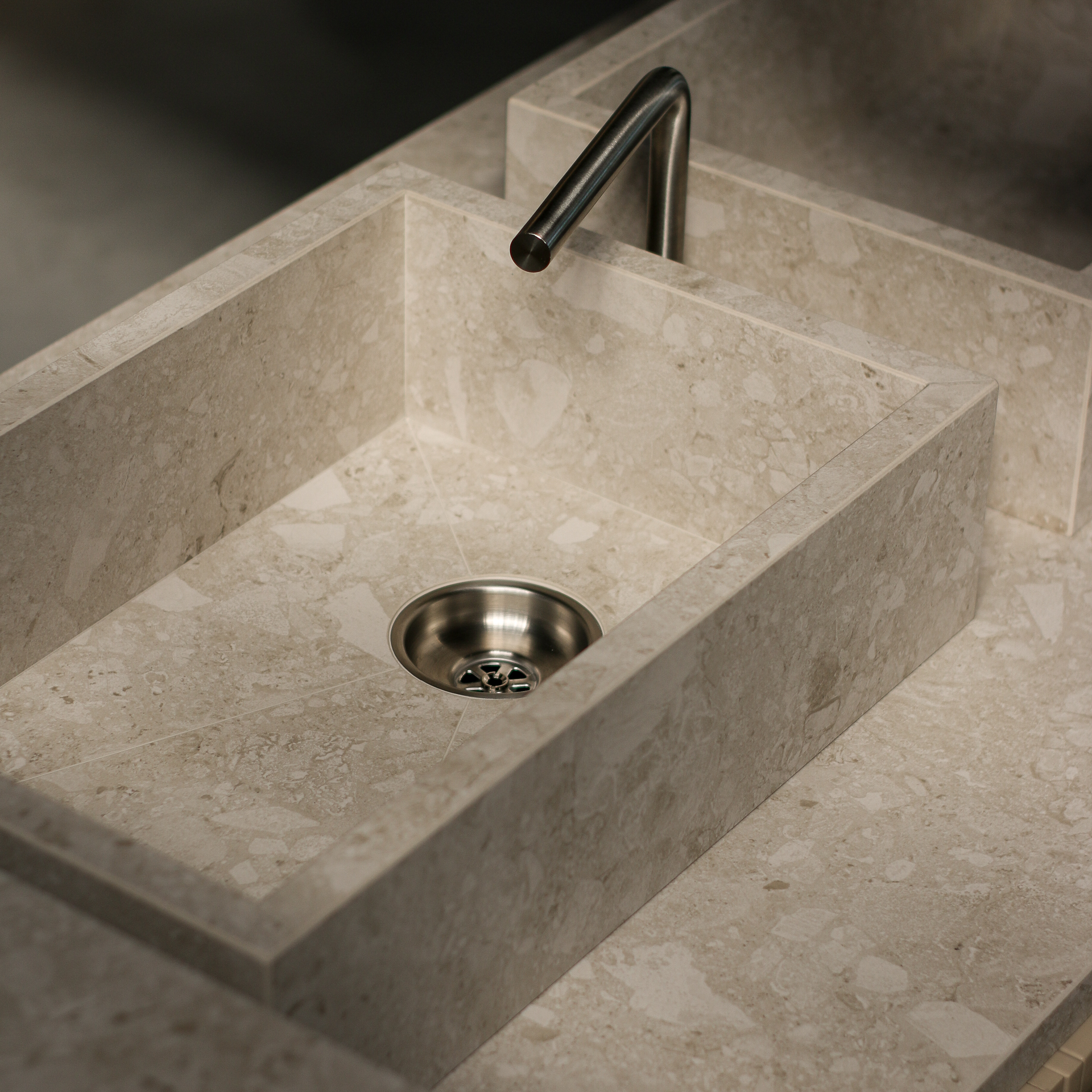 Floating Bar stone worktop and concealed Iroko storage detail